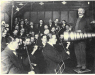 Plate 1: Edward Elgar and
                    musicians posing at a 1914 recording
                    session